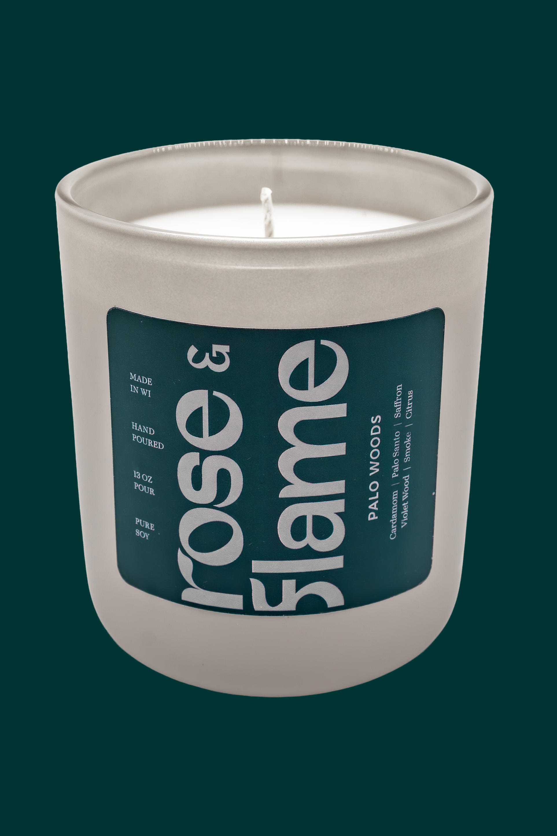 Palo Woods 13 oz soy candle in a glass jar
